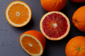 Vitamin citrus fruits on a dark background - oranges