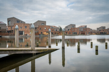 Fototapeta premium Modern neighbourhood at the Oosterlaakplas lake in Houten, Province Utrecht, The Netherlands