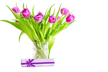 Violet purple tulips colorful bouquet in vase.Beautiful tenderness flowers,gift jewelry box,macro close up.Spring floral romantic card isolated.Flower shop,florist design,Womens,Valentines,Mother day