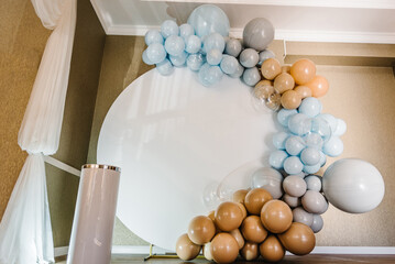 Arch decorated with blue, brown, and grey balloons. Baby Shower. Wedding reception. Photo-wall...
