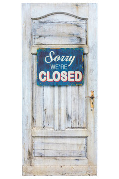 Weathered wooden door with closed sign