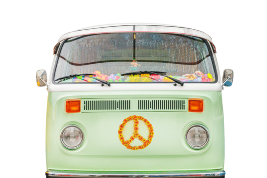 Vintage green camper home with peace sign and flowers