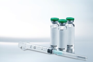 Bottles of medical vaccine for virus vaccination.