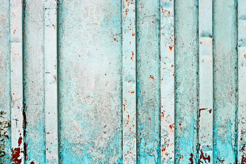 Old metal surfaces covered with rust and paint residue. Rust patterns as base and background.