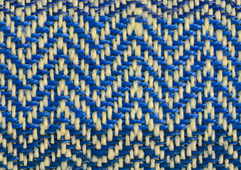 Close-up of handwoven piece of twill fabric, woven with linen and cotton yarn.