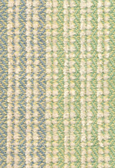 Close-up of handwoven piece of twill fabric, woven with linen and cotton yarn.