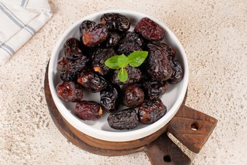 ajwa date or kurma ajwa,traditional Ramadan iftar meal. Ramadan kareem fasting month concept	