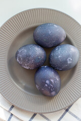 easter eggs on a gray plate