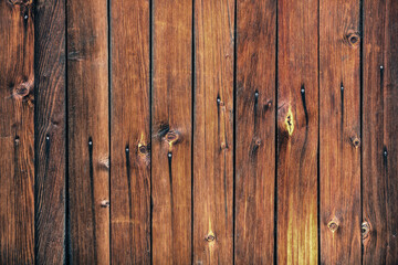 Wood texture. Wooden plank grain background. Striped timber desk closeup. Old table or floor. Brown boards.