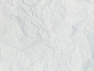 Abstract creased or wrinkled or crumbled white and gray paper texture background, Old and stained white or grey paper with grainy and wrinkled or crumbled stains.
