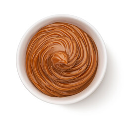 Melted caramel cream isolated on white background, top view