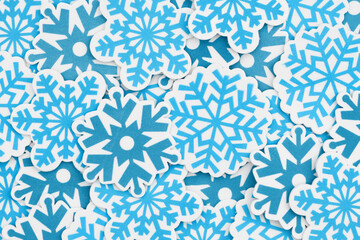 Lots of blue snowflakes winter background