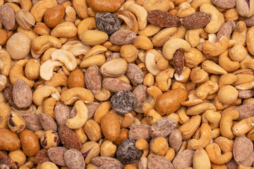A group of almonds, pistachios, walnuts, macadamia, cashews.