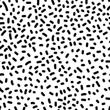 Seamless pattern with abstract black and white spots on white background.