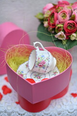 beautiful bone china cup in a heart-shaped packing box.