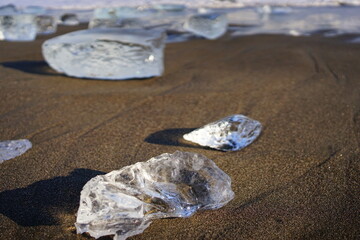 Fototapeta na wymiar Jewelry Ice, Glittering Frozen Ice Gemstone on Otsu Beach in Hokkaido, Japan - 日本 北海道 豊頃町 ジュエリーアイス