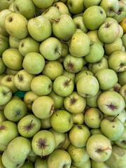 lots of ripe apples fruit food vitamins healthy nutrition as background