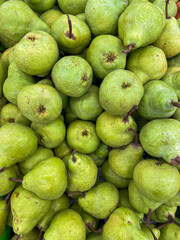 lots of green pears fruit food vitamins healthy nutrition as background