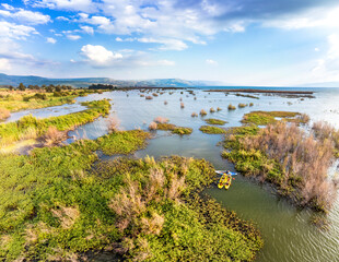Sea of Galilee, Israel- 4 November 2022: Aerial view of people kayaking in a lake.