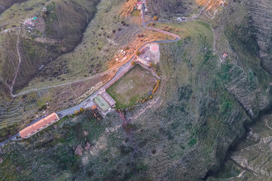 Aerial view of a football field on hilltop in Centuripe, Enna, Sicily, Italy.