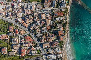 Aerial view of a residential district facing the Mediterranean Sea in Avola, Syracuse, Sicily, Italy.