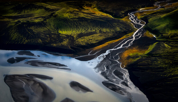 Aerial view of water formation at river estuary in Iceland highlands.