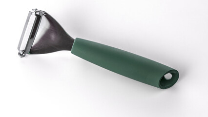 Peeler for cleaning vegetables and fruits isolated on a white background.