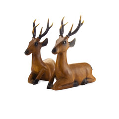 Deer carved wood isolated on white background.