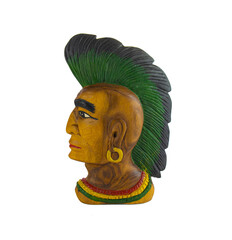 Wood carved Indian with head over a white background