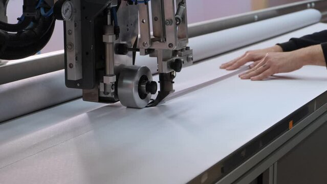 Machine for welding poly chlorine vinyl PVC fabric in work. Close-up 4k. Production of curtains and roller blinds.