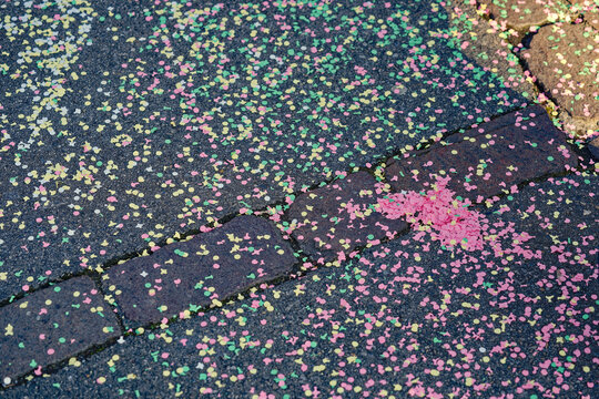 Children carnival of cr&egrave;ches with colorful confetti on the floor at City of Z&uuml;rich district Schwamendingen on a sunny winter day. Photo taken February 10th, 2023, Zurich, Switzerland.