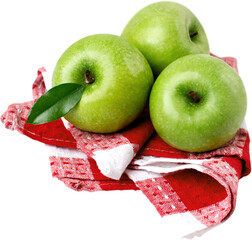Three apples on a napkin