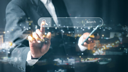 Businessman use smart phone Search On Virtual Screen Data Search Technology Search Engine Optimization. Searching for information. Using Search Console for data, info.