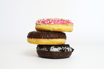 three different donuts on top of each other