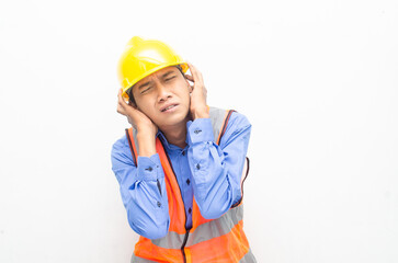 stressed over work concept illustrated by asian male construction worker in blue shirt, orange vest and yellow safety helmet with furious, mad, sad, angry expression. overworked concept