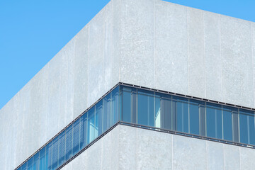 white and grey  warehouse building with windows