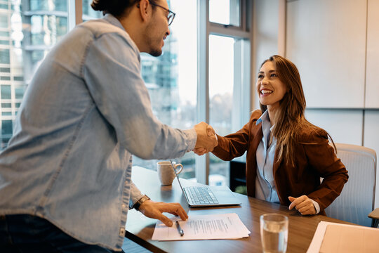 Happy Human Resource Manager Congratulates Her Candidate After Successful  Job Interview In Office.