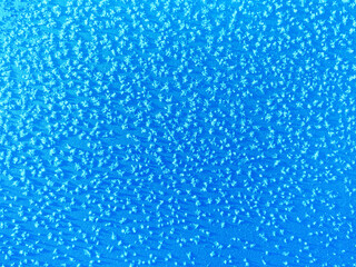 Beautiful blue frost patterns with snowflakes on it. Christmas or New year background.