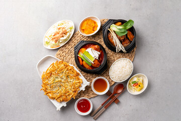 Fototapeta na wymiar Korean food dishs Chicken Stir-fry Stew Potato Pancakes