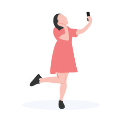 good looking woman walking and using phone