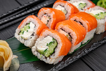 Classic Philadelphia sushi roll set with salmon and cream cheese.