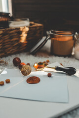 Wax printing tools on the background of candles