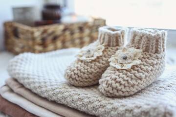 Handmade knitted socks for a newborn close-up