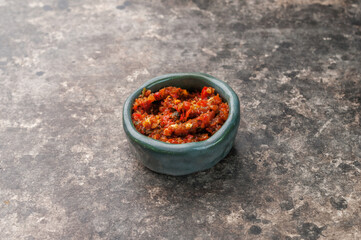 georgian ajika sauce on gray background