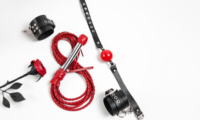 For the March 8 women's day holiday sexy bdsm sex play accessories set from a sex shop on a white...