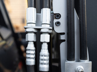 closeup of hydraulic hoses on a fork lift truck