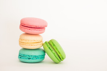 colorful macaroons isolated on white background, free copy space