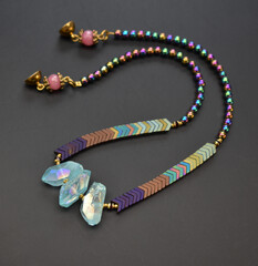 Colorful stone crystal beads necklace, unique handmade gemstone jewelry background, promotional...