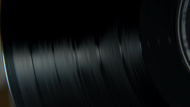 Black vinyl Retro record on DJ turntable. 