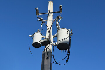 Power transformers on a pole to power the building